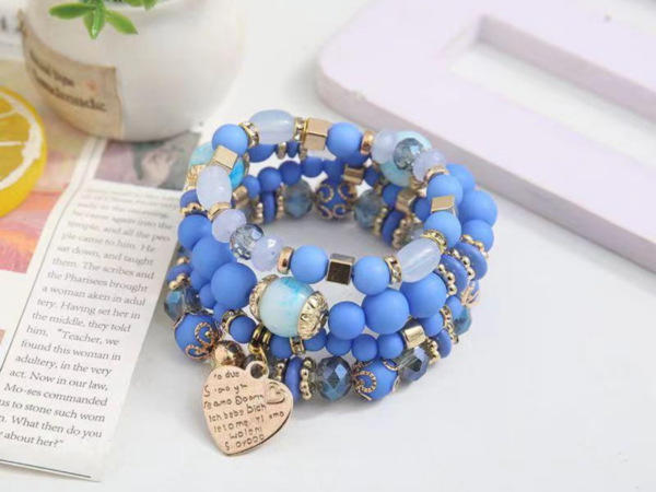 Ensemble de 4 Bracelets Bohèmes avec Perles et Pendentif Métal en Forme de Cœur – Style Élégant et Raffiné, Couleur Bleu Foncé pour Femme.